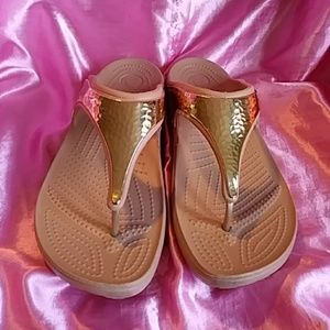 Gold & tan Crocs sandals